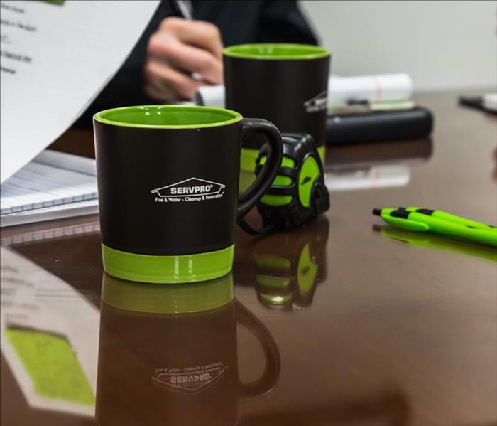 SERVPRO cups on table